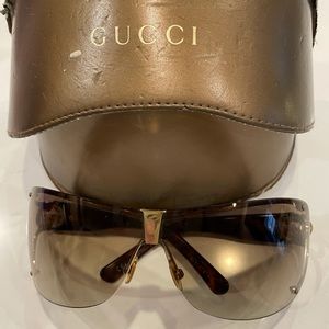 Gently used Gucci sunglasses with case